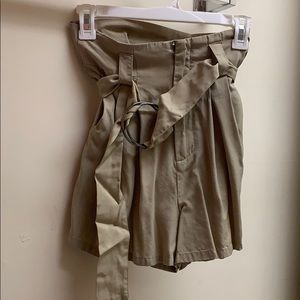 tan paper bag shorts with belt buckle